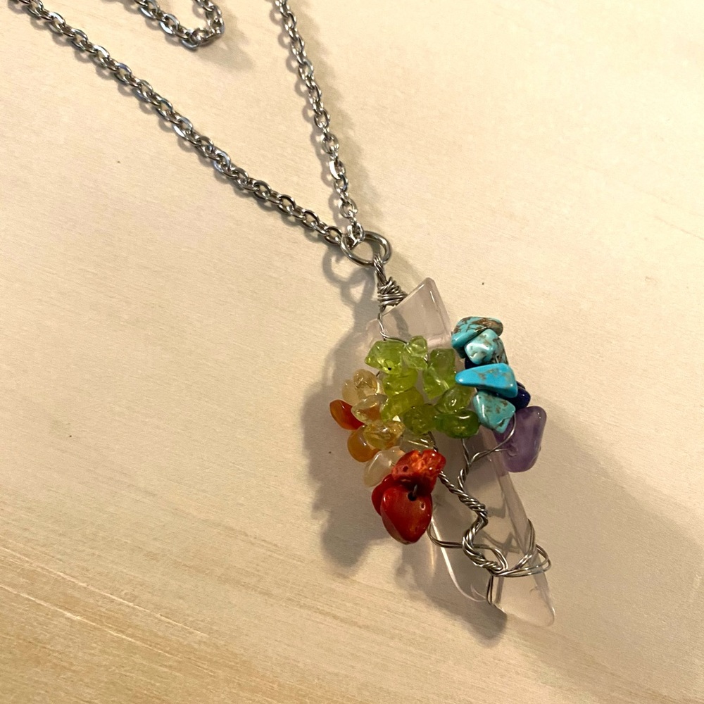 Natural multi stoned tree wrapped around crystal
